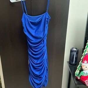 Beautiful blue tight dress with a open back size small